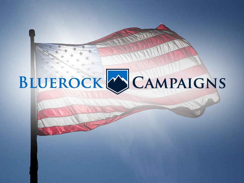 American flag in sunlight with the Bluerock Campaigns logo